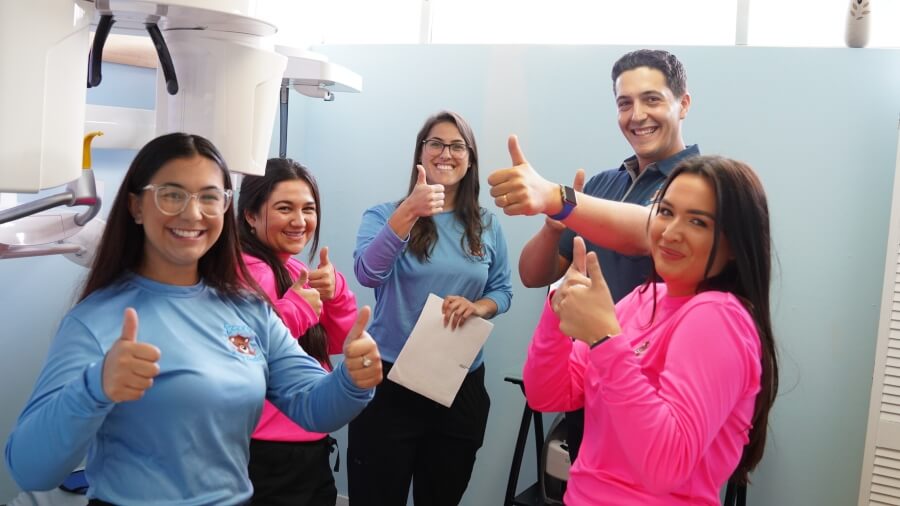 All thumbs up - Izzy's Kidz Dentistry